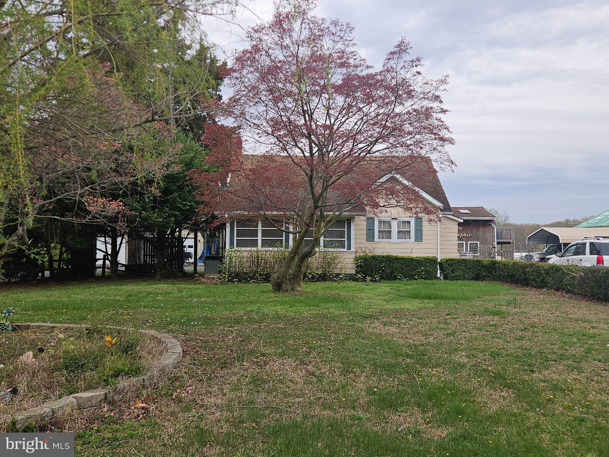 1737 South Burlington Road Bridgeton, NJ 08302 - Photo 1 of 64 a front view of a house with a garden