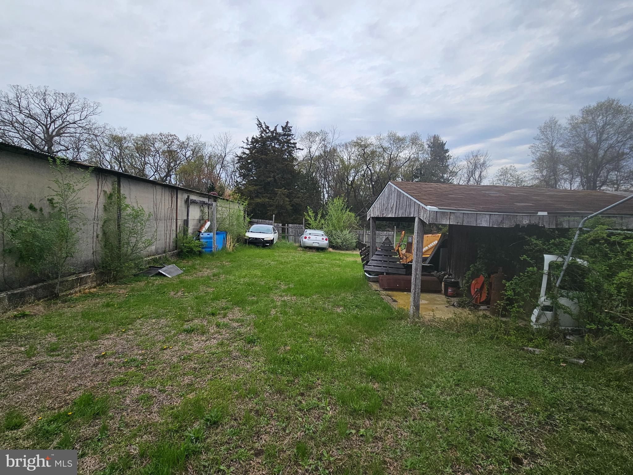 1737 South Burlington Road Bridgeton, NJ 08302 - Photo 15 of 64 a view of a house with backyard and a sitting area
