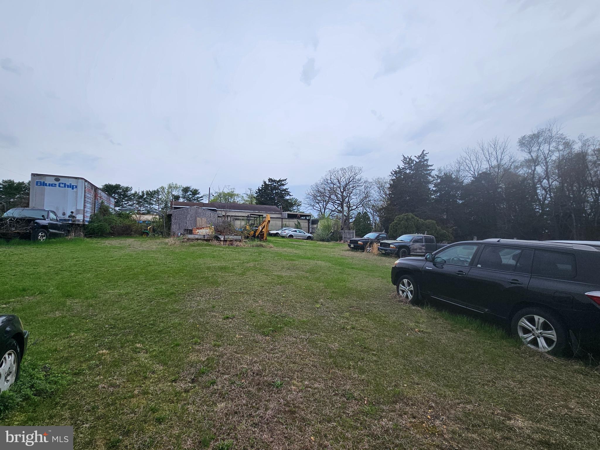 1737 South Burlington Road Bridgeton, NJ 08302 - Photo 16 of 64 a view of yard with outdoor space and car parked