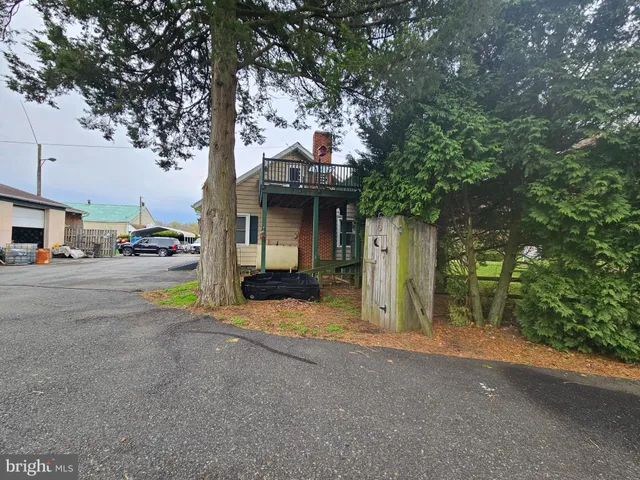 a view of a chairs and tables in patio