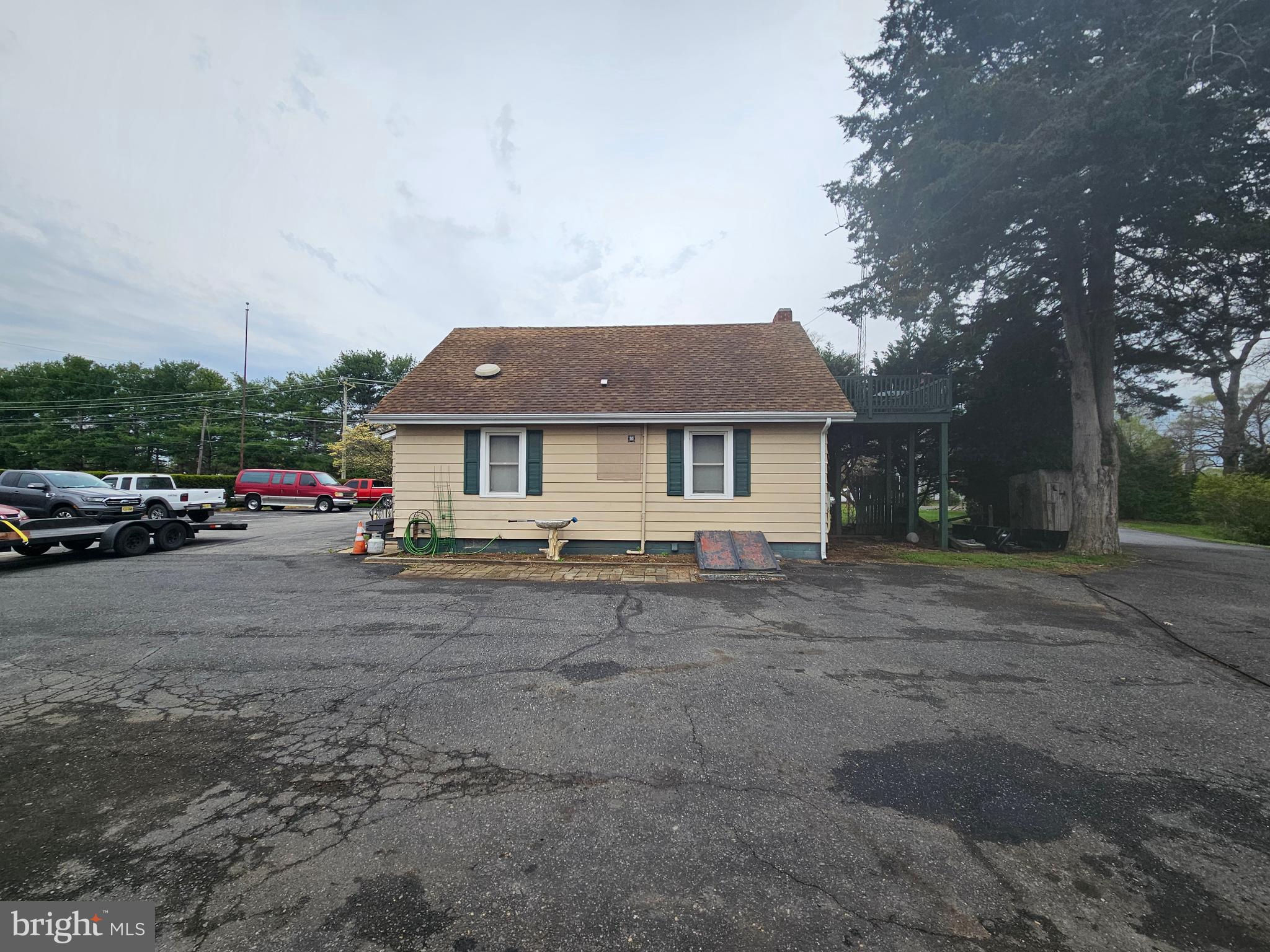 1737 South Burlington Road Bridgeton, NJ 08302 - Photo 28 of 64 a car parked in front of white house