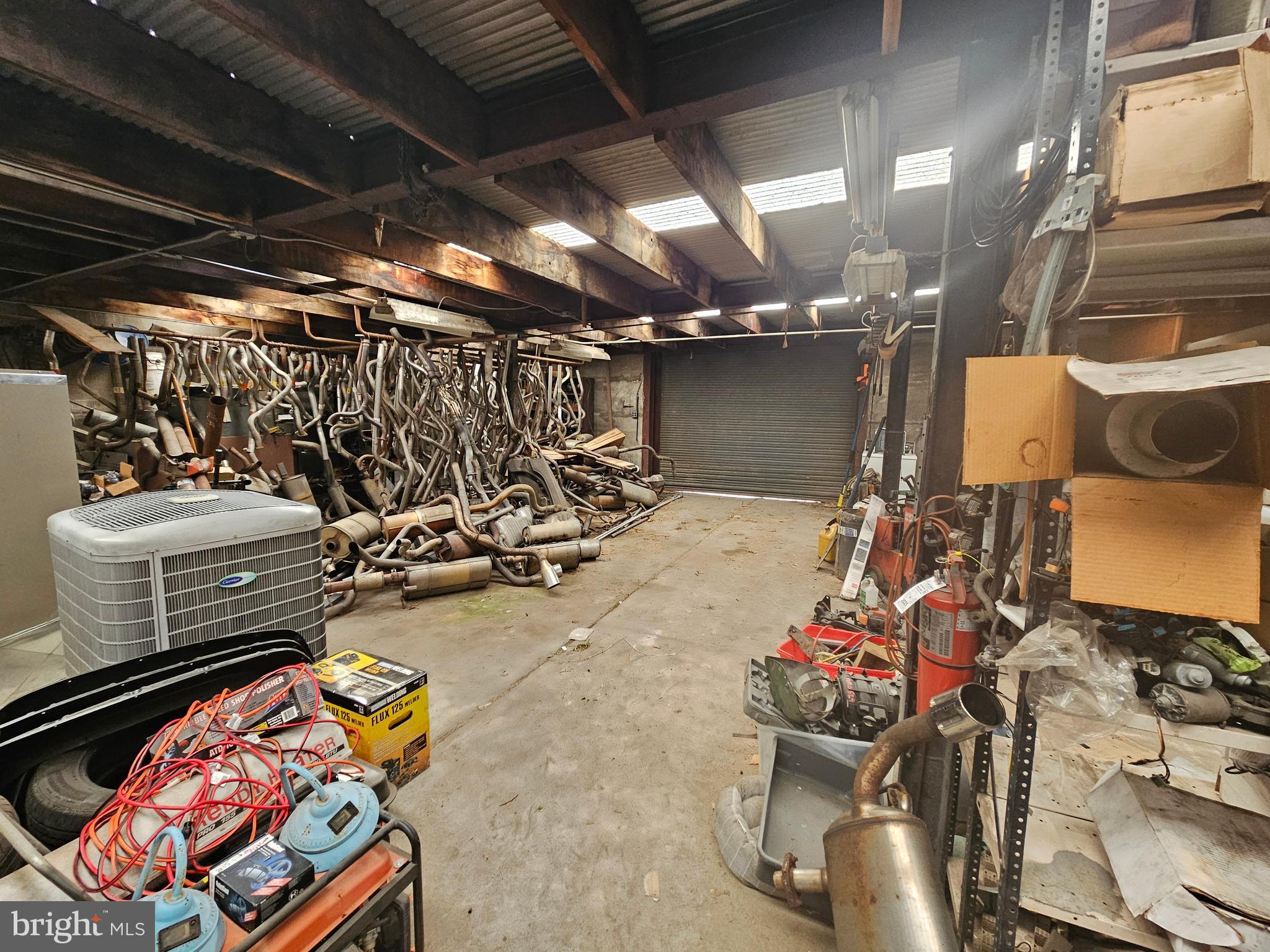 1737 South Burlington Road Bridgeton, NJ 08302 - Photo 45 of 64 a view of a storage room with a lot of stuff