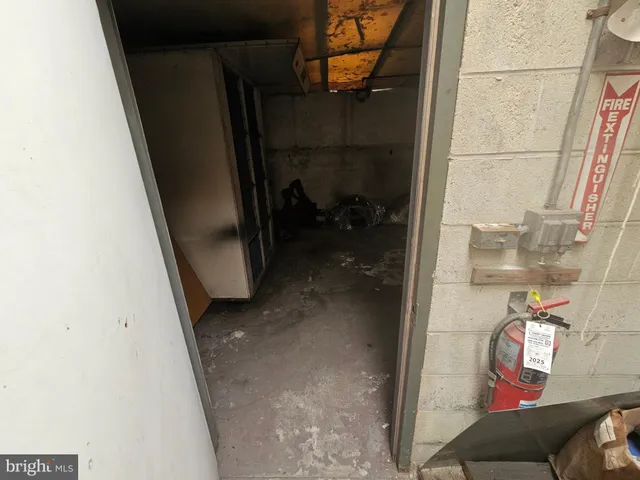 a view of a room with rack on the wall