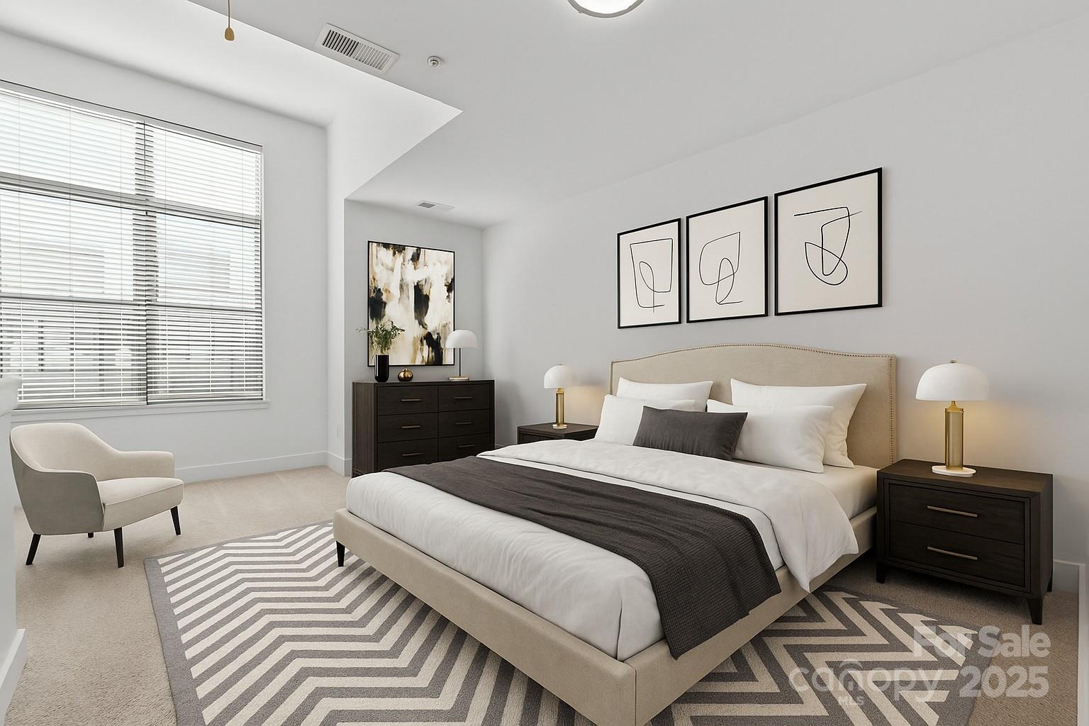 927 East 8th Street Charlotte, NC 28204 - Photo 13 of 35 a bedroom with a bed and a couch