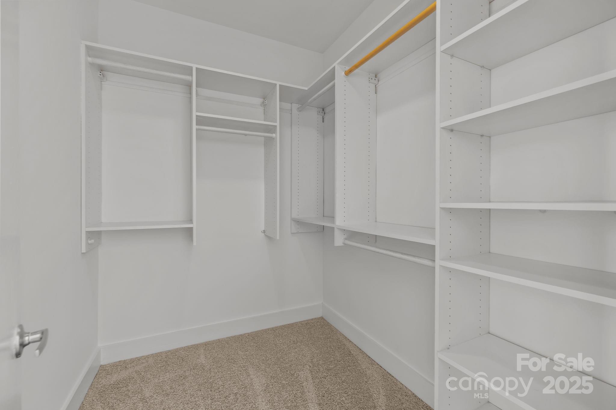 927 East 8th Street Charlotte, NC 28204 - Photo 16 of 35 a view of an empty walk in closet