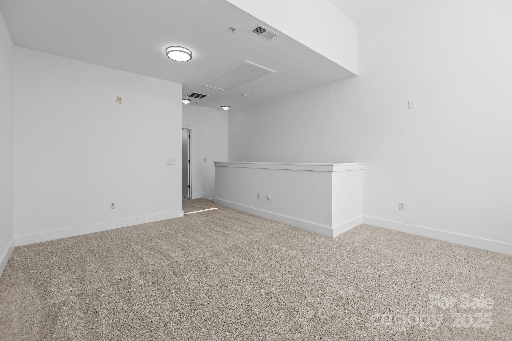 927 East 8th Street Charlotte, NC 28204 - Photo 18 of 35 a view of an empty room