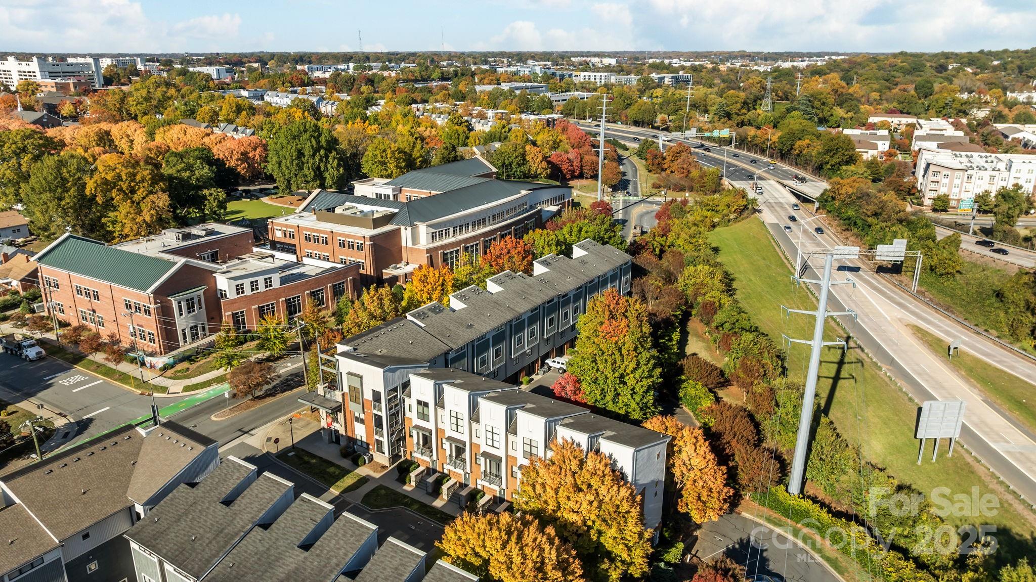927 East 8th Street Charlotte, NC 28204 - Photo 32 of 35 an aerial view of residential building with parking