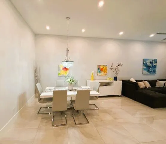 a living room with furniture and a couch