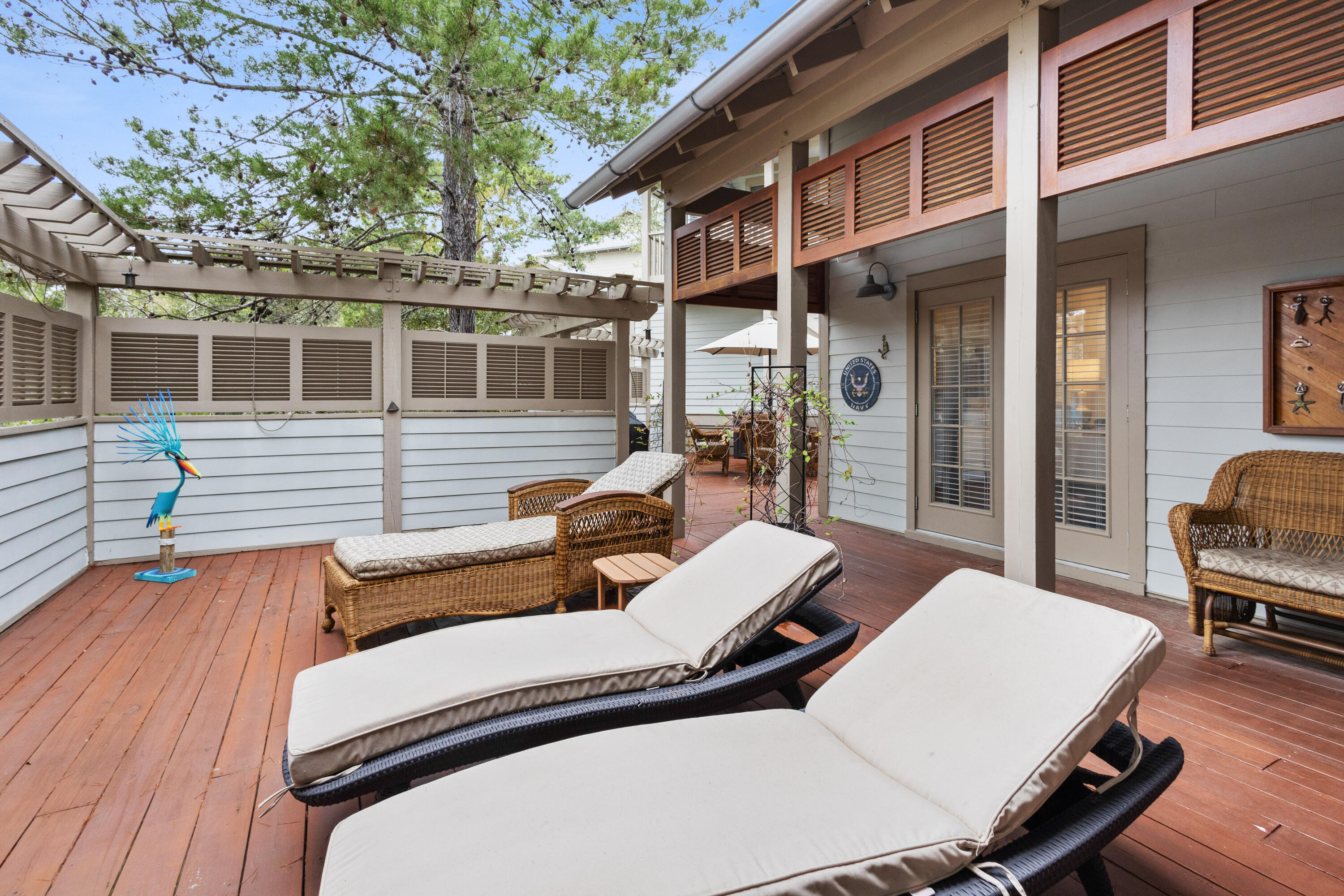58 South Summit Drive Santa Rosa Beach, FL 32459 - Photo 1 of 40 a view of a patio with wooden floor