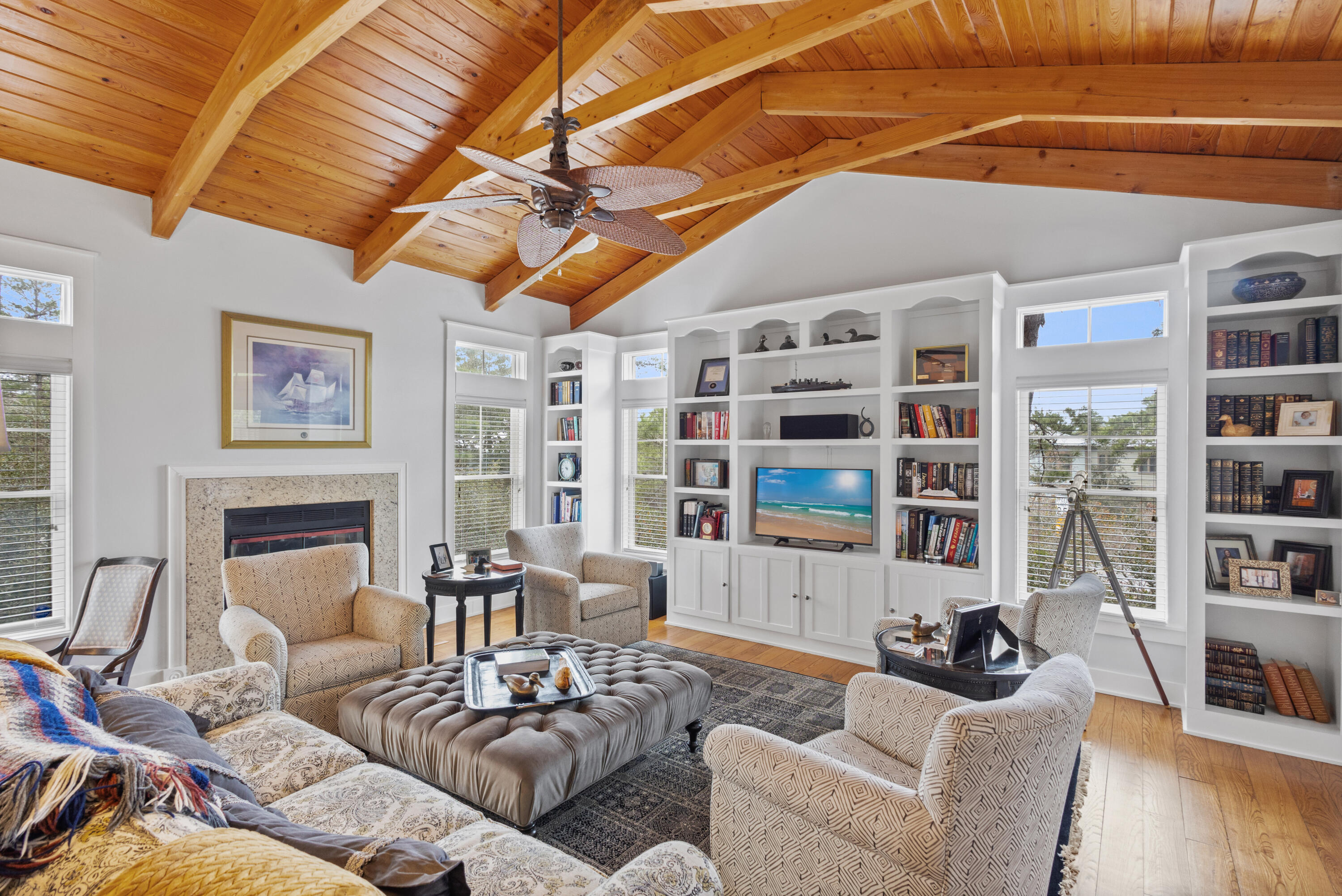 58 South Summit Drive Santa Rosa Beach, FL 32459 - Photo 11 of 40 a living room with furniture and a book shelf