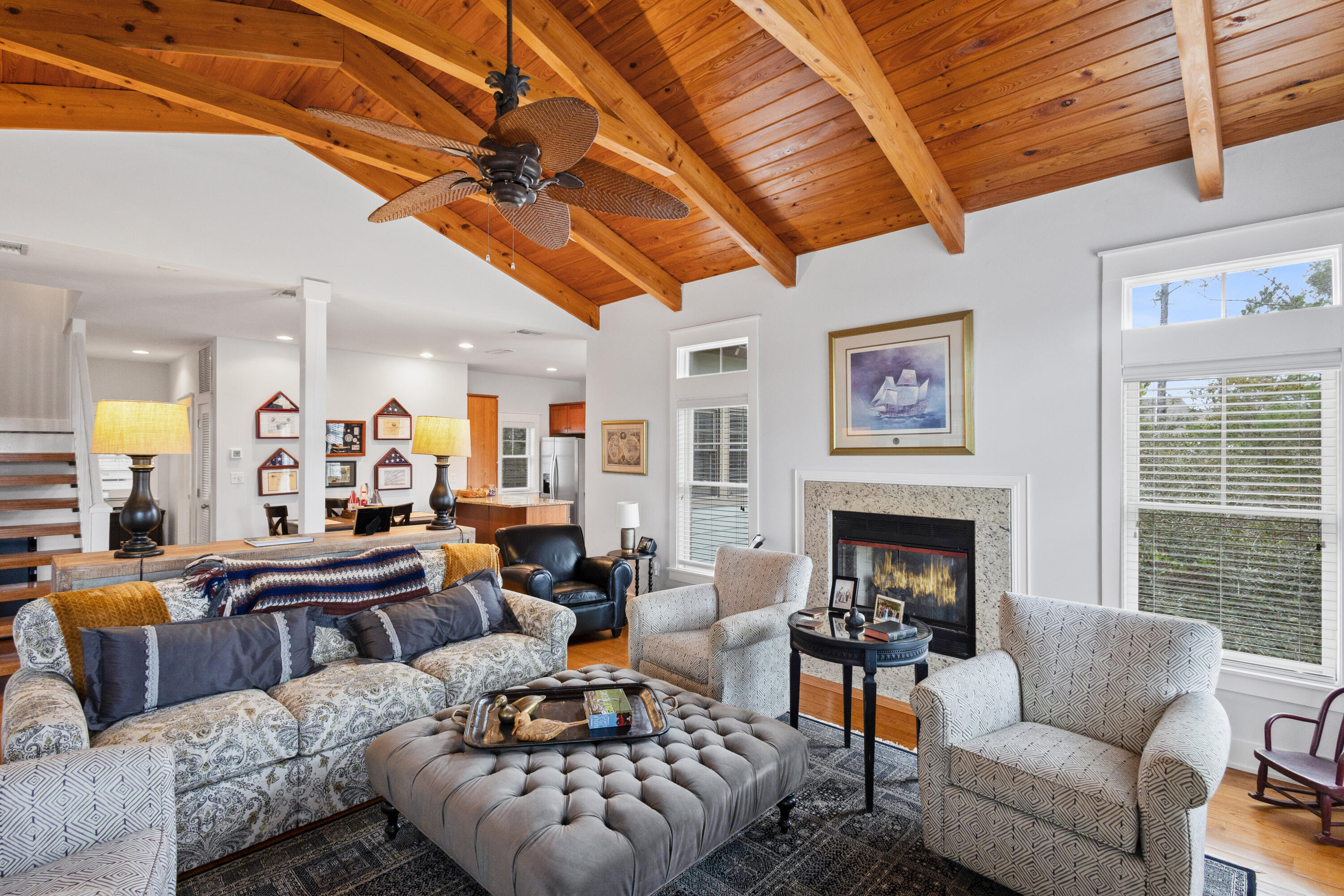 58 South Summit Drive Santa Rosa Beach, FL 32459 - Photo 12 of 40 a living room with furniture a fireplace and a table
