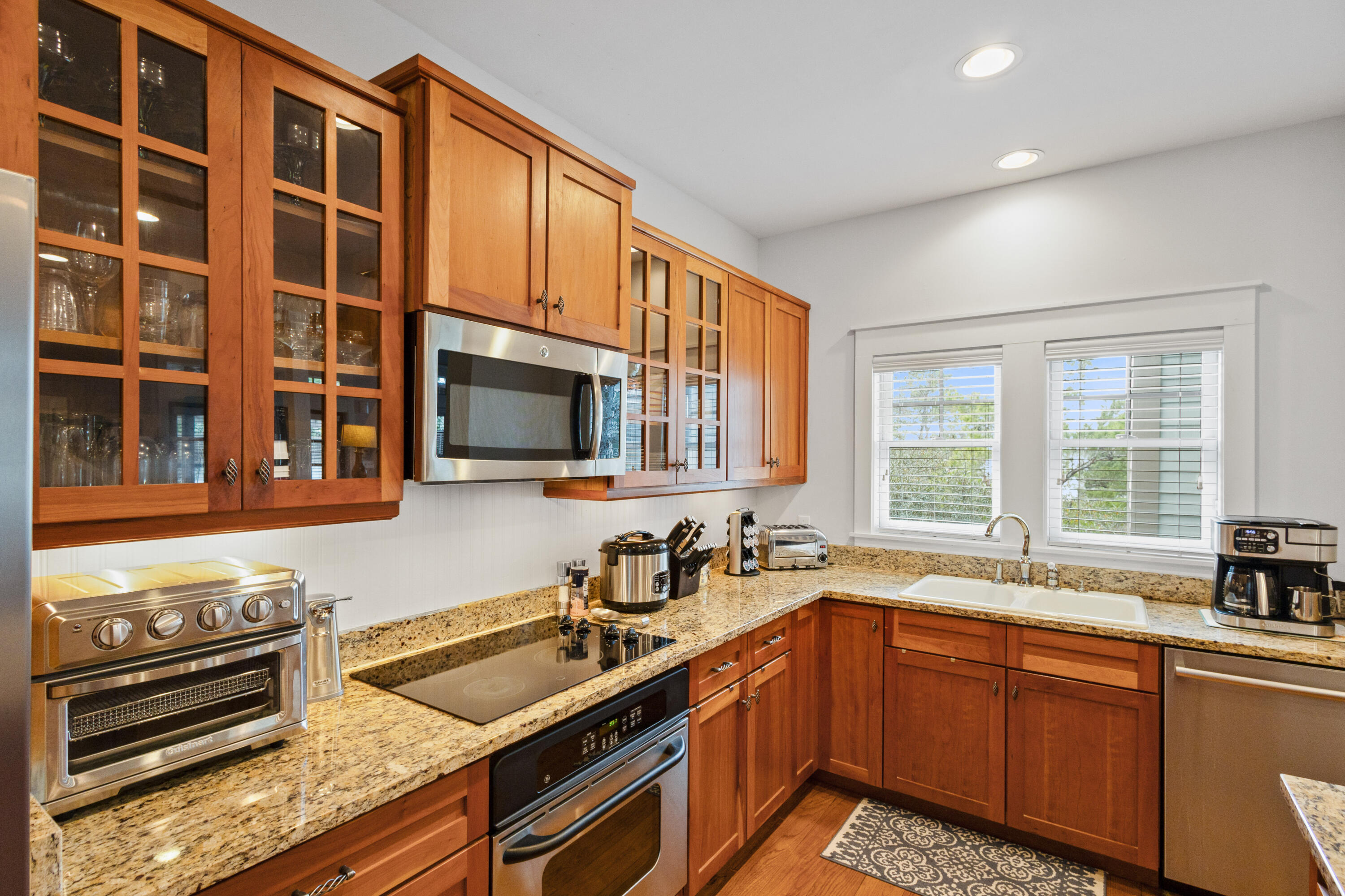 58 South Summit Drive Santa Rosa Beach, FL 32459 - Photo 17 of 40 a kitchen with a sink stove and microwave