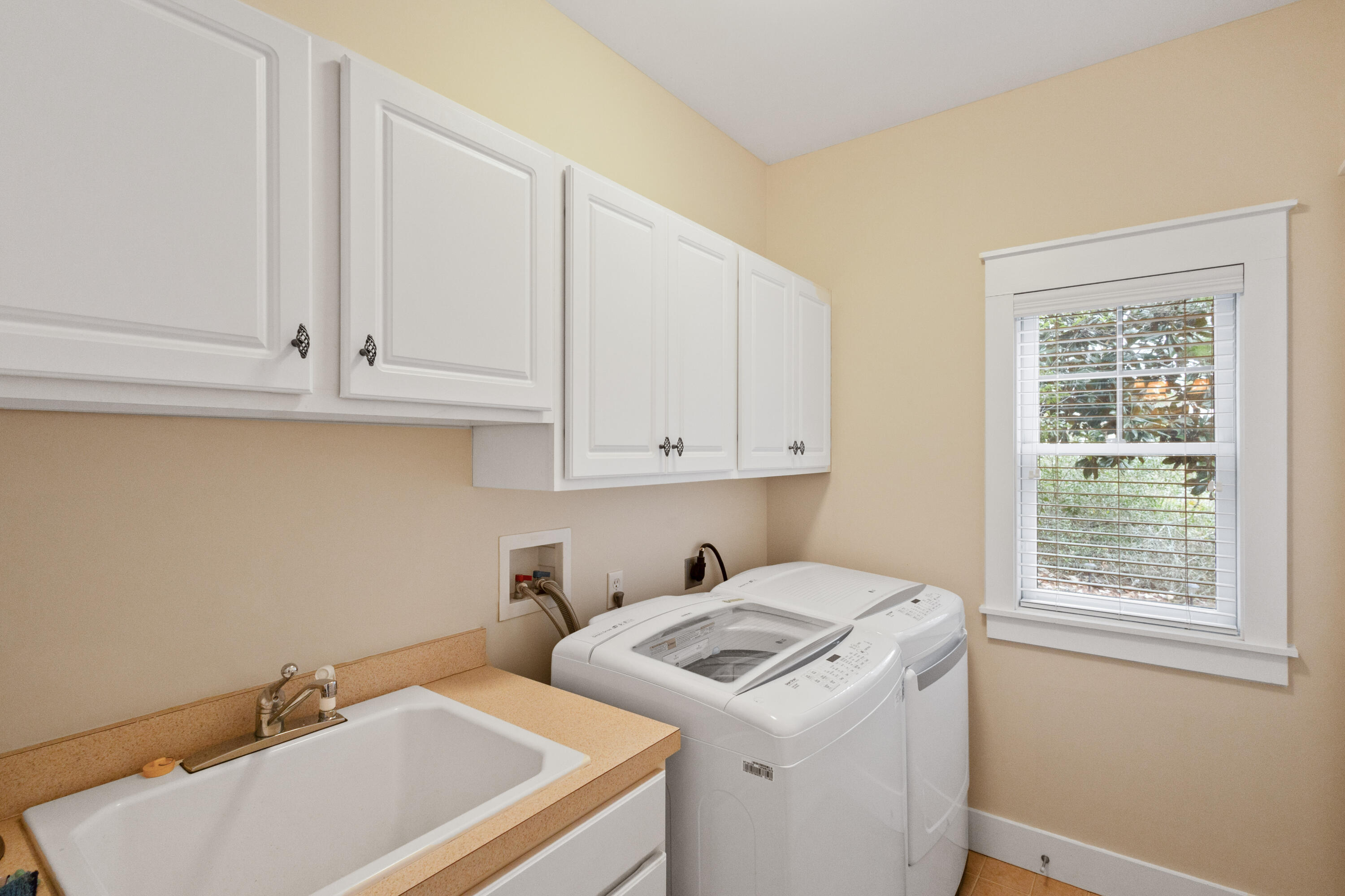 58 South Summit Drive Santa Rosa Beach, FL 32459 - Photo 18 of 40 a view of storage and utility room with washer and dryer