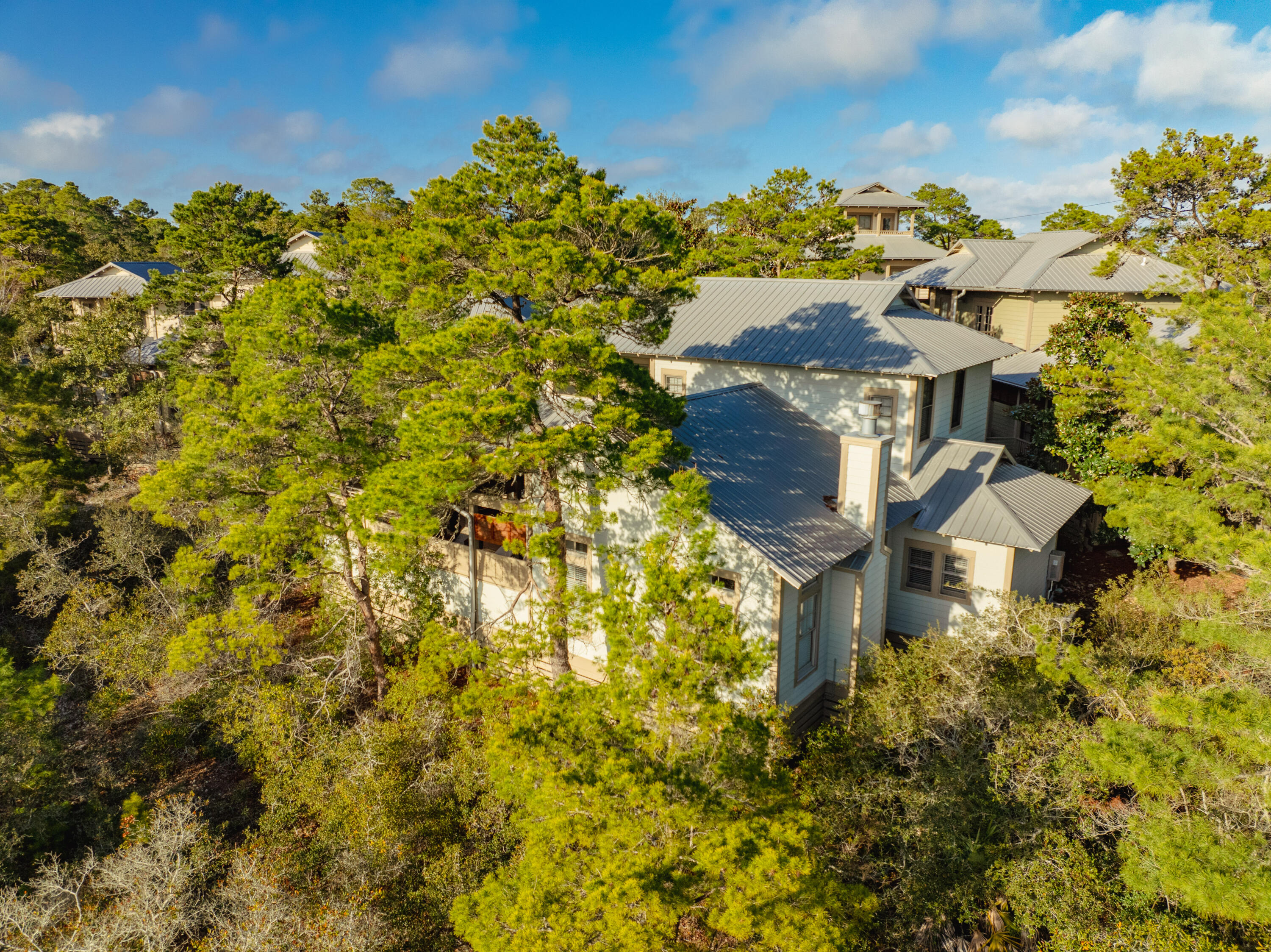 58 South Summit Drive Santa Rosa Beach, FL 32459 - Photo 2 of 40 a aerial view of a house with a yard swimming pool and outdoor seating