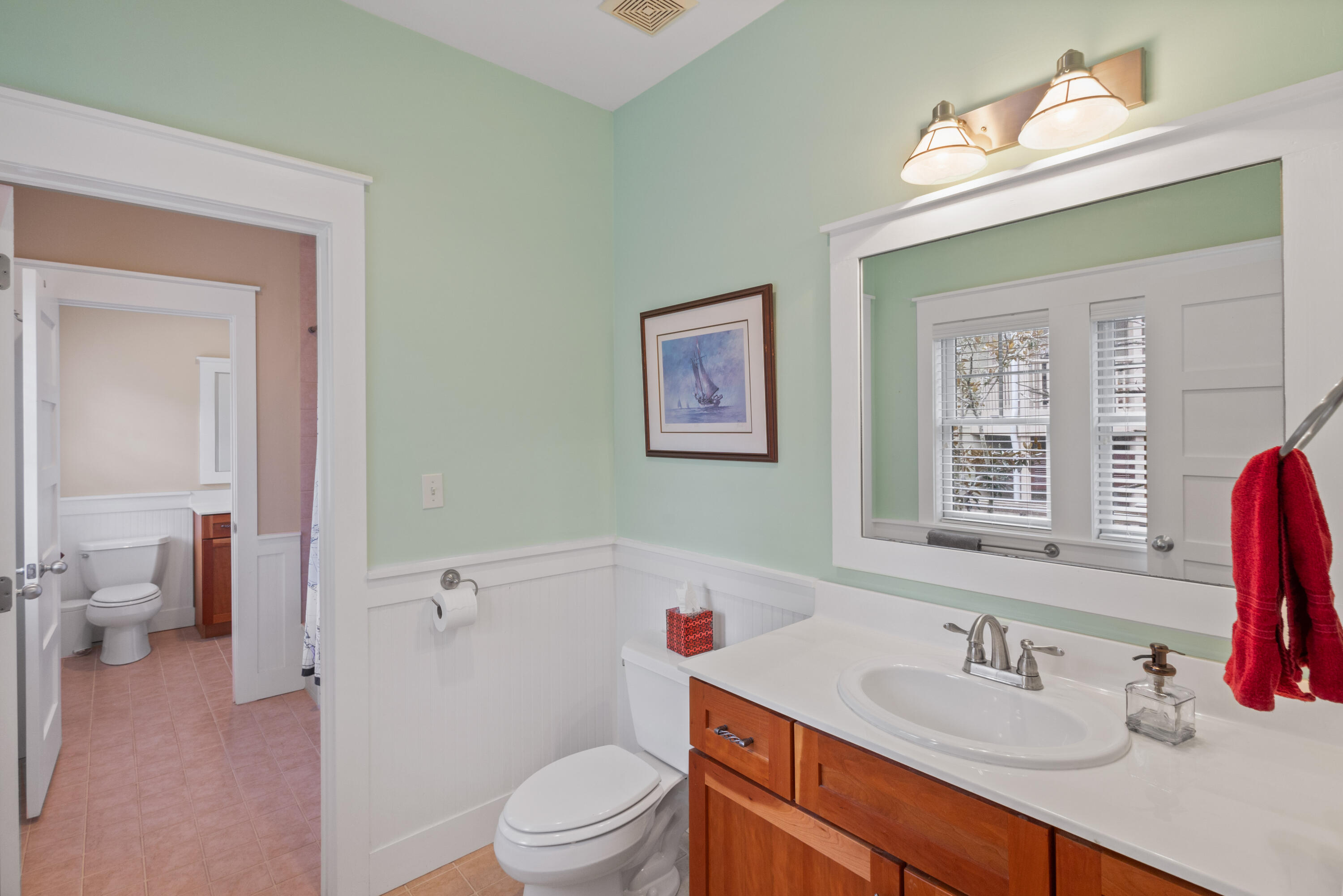 58 South Summit Drive Santa Rosa Beach, FL 32459 - Photo 28 of 40 a bathroom with a sink vanity granite and toilet