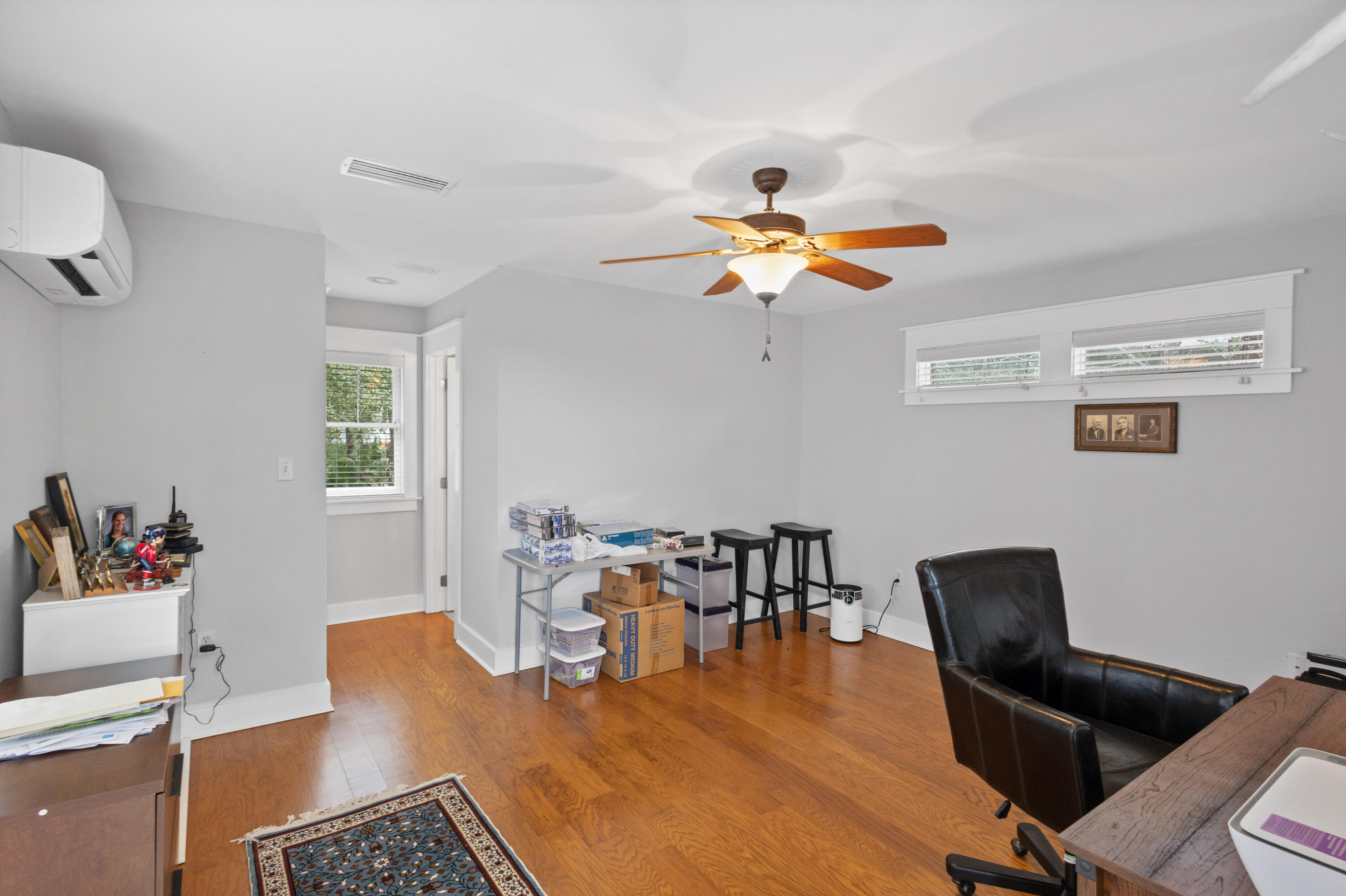 58 South Summit Drive Santa Rosa Beach, FL 32459 - Photo 35 of 40 a view of a dining room with a table and a chandelier