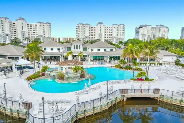 a view of a swimming pool with a terrace