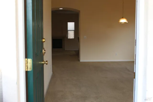 a view of a livingroom with a fireplace