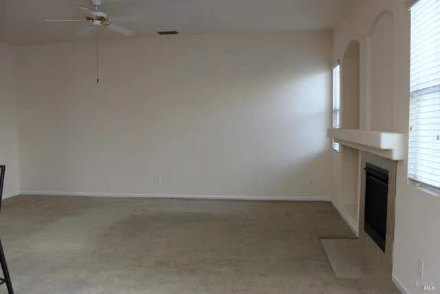 a kitchen with stainless steel appliances a refrigerator and a cabinets