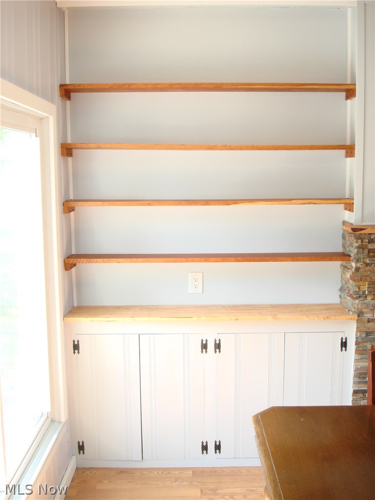919 Richmond Road Cleveland, OH 44124 - Photo 21 of 35 Hand planed shelving adds a nice final touch to this modern kitchen in this vintage home!