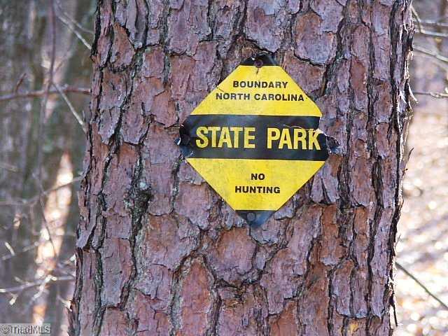 3 Shoals Rd Shoals Pinnacle, NC 27043 - Photo 1 of 11 Land. Land joins Pilot Mountain State Park
