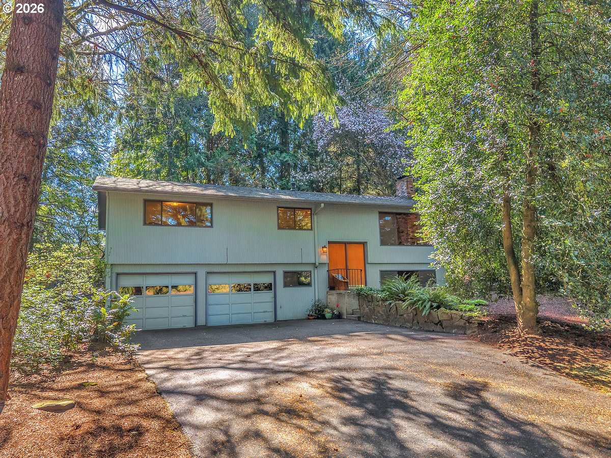 9200 Southwest Elrose Court Portland, OR 97224 - Photo 3 of 46 a view of a house with a street