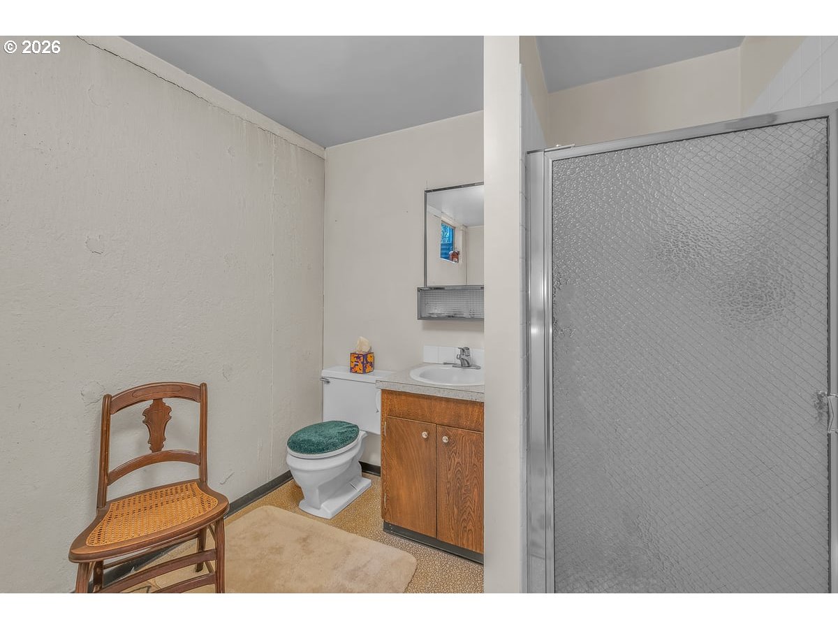 9200 Southwest Elrose Court Portland, OR 97224 - Photo 33 of 46 a bathroom with a toilet and a sink