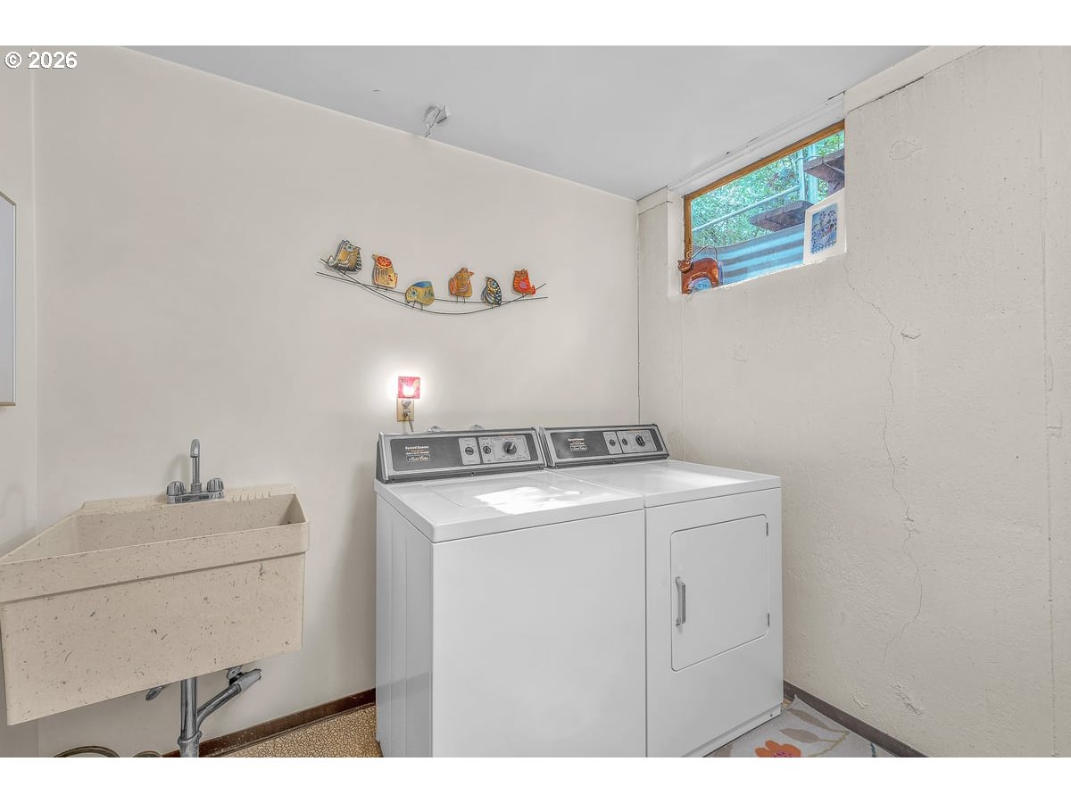 9200 Southwest Elrose Court Portland, OR 97224 - Photo 34 of 46 a utility room with dryer and washer