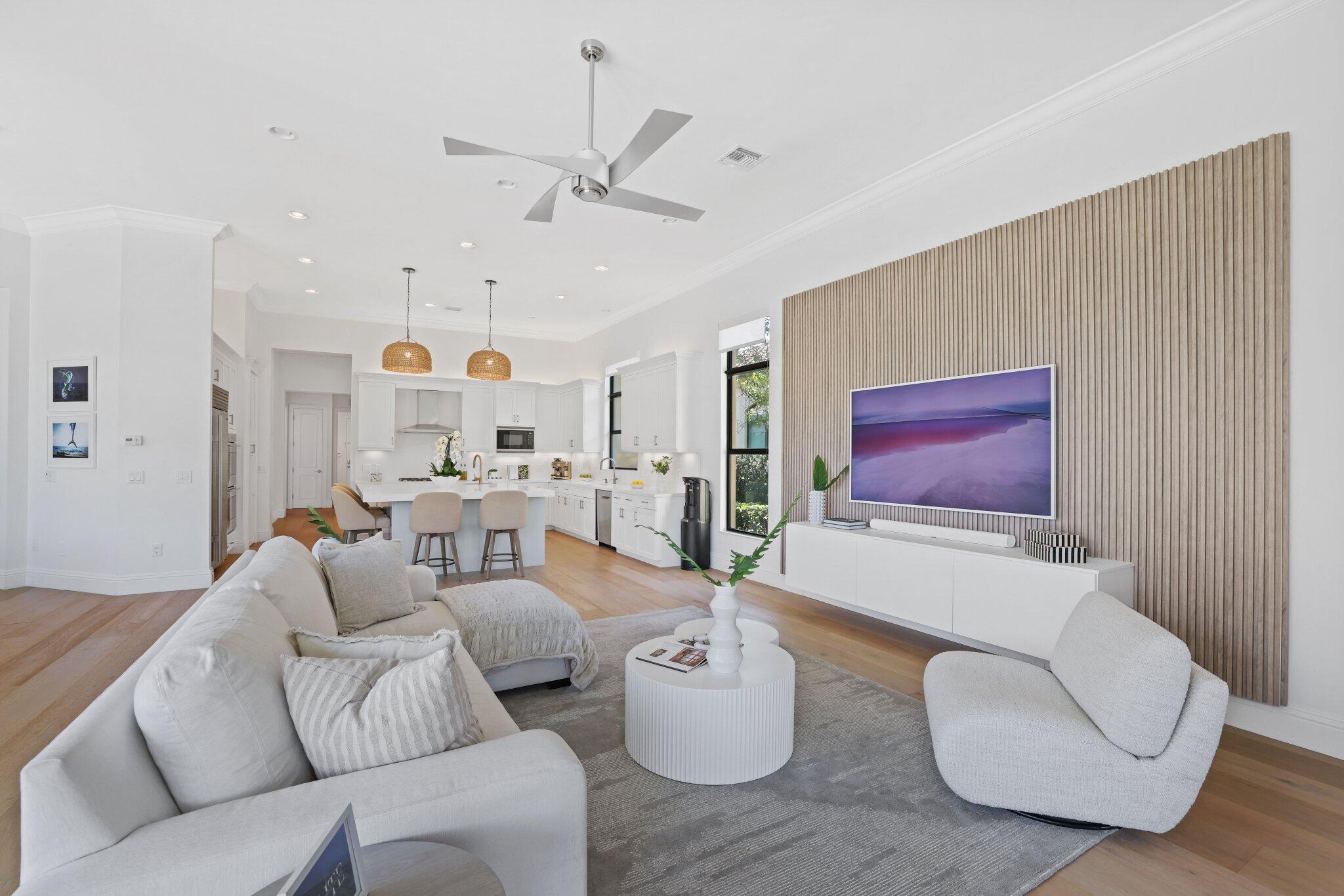 9599 Moritz Way Delray Beach, FL 33446 - Photo 17 of 75 a living room with furniture and a flat screen tv