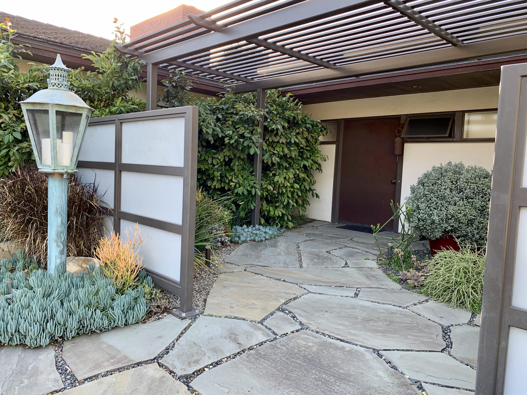 950 Monte Drive Santa Barbara, CA 93110 - Photo 1 of 39 a front view of a house with garden