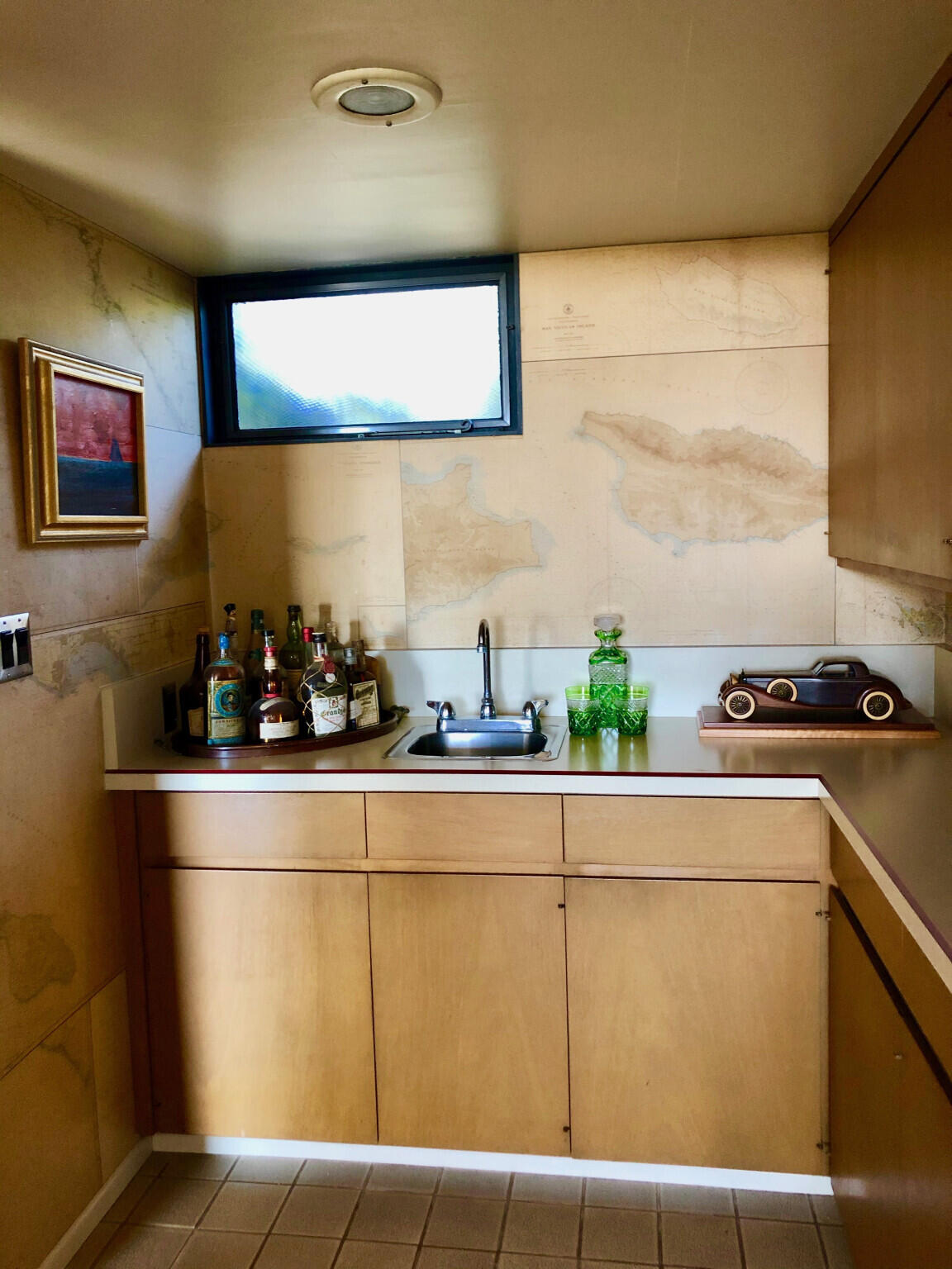 950 Monte Drive Santa Barbara, CA 93110 - Photo 16 of 39 a kitchen with a sink and cabinets