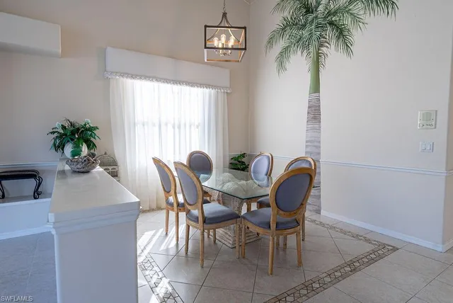 a kitchen with a stove a sink and a refrigerator