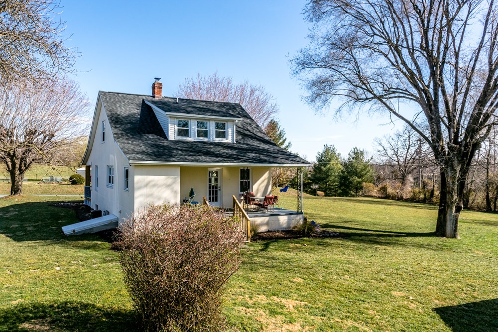 8687 Union Springs Road Dayton, VA 22821 - Photo 25 of 37 a front view of a house with garden