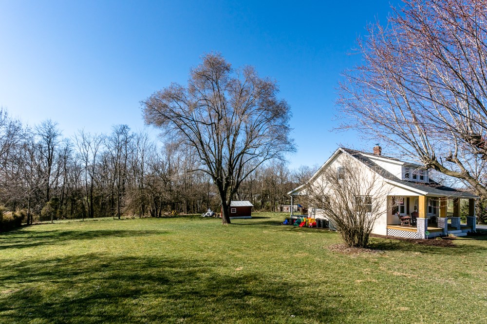 8687 Union Springs Road Dayton, VA 22821 - Photo 30 of 37 a view of a house with a yard