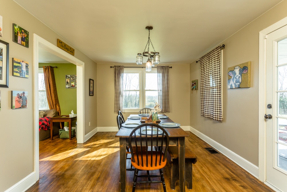 8687 Union Springs Road Dayton, VA 22821 - Photo 4 of 37 a dining room with furniture and window