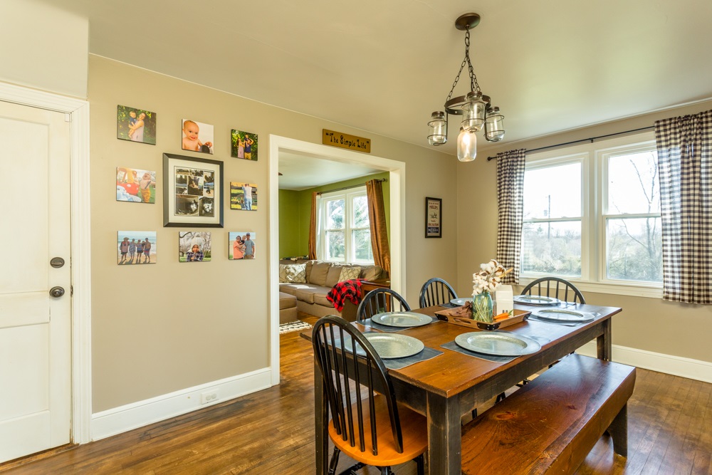 8687 Union Springs Road Dayton, VA 22821 - Photo 7 of 37 a view of a dining room with furniture window and wooden floor