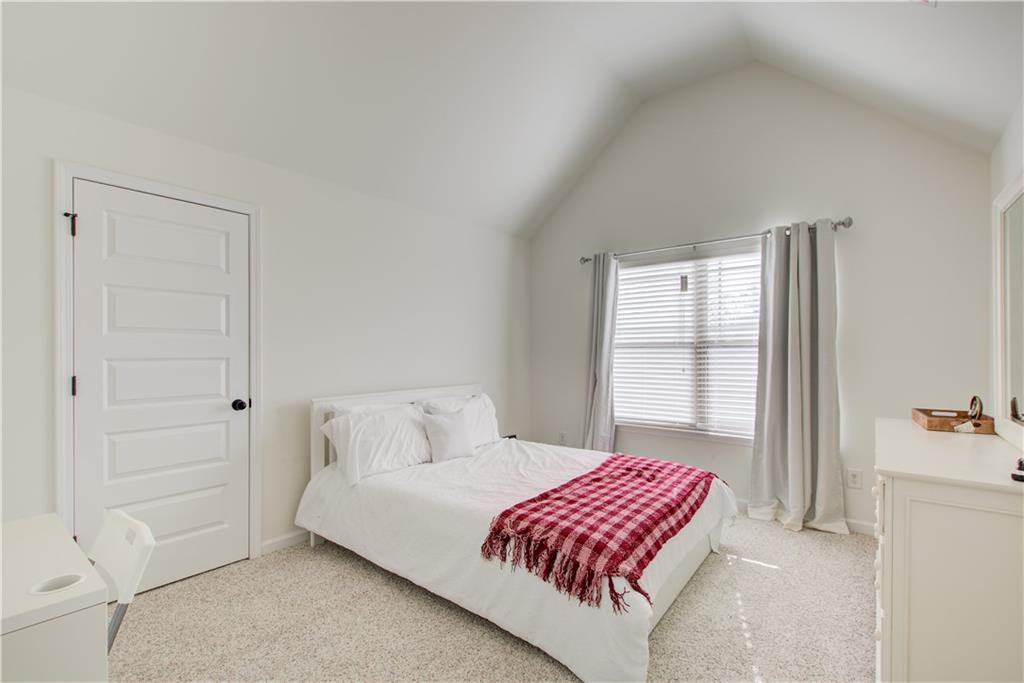 1979 Trinity Mill Drive Dacula, GA 30019 - Photo 17 of 26 a bedroom with a bed and a window
