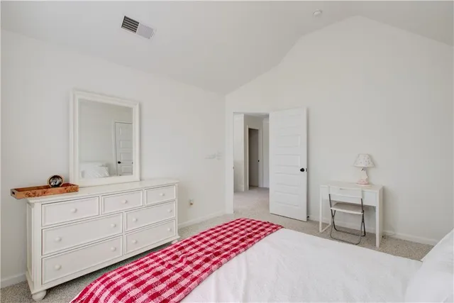 a bathroom with bathtub and shower