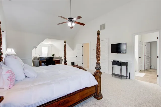 a bedroom with furniture and window