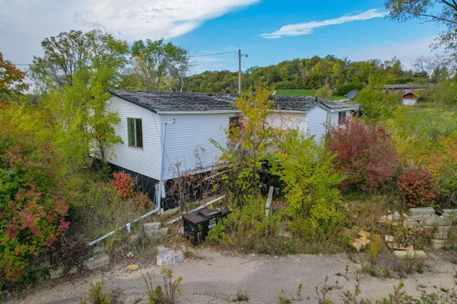 a aerial view of a house with a yard