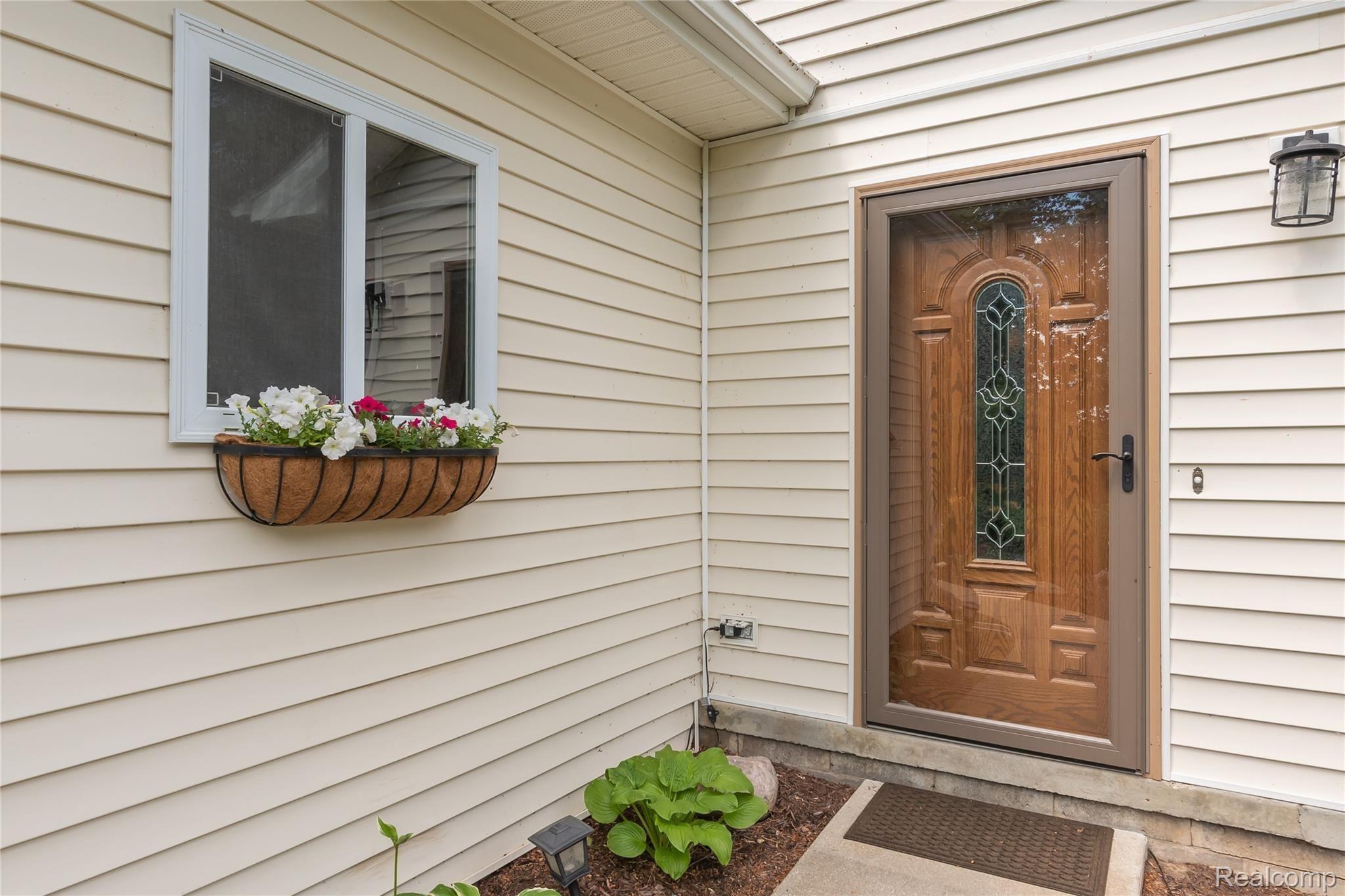 5105 Fish Lake Road Highland, MI 48357 - Photo 25 of 32 Out Front Entrance.jpg