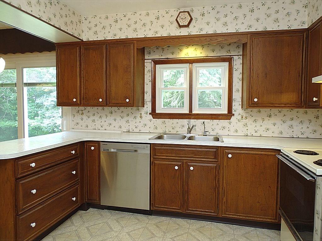 190 Deerfield Road Washington, PA 15301 - Photo 11 of 25 Attractive walnut cabinets, laminate countertop & double bowl stainless steel sink