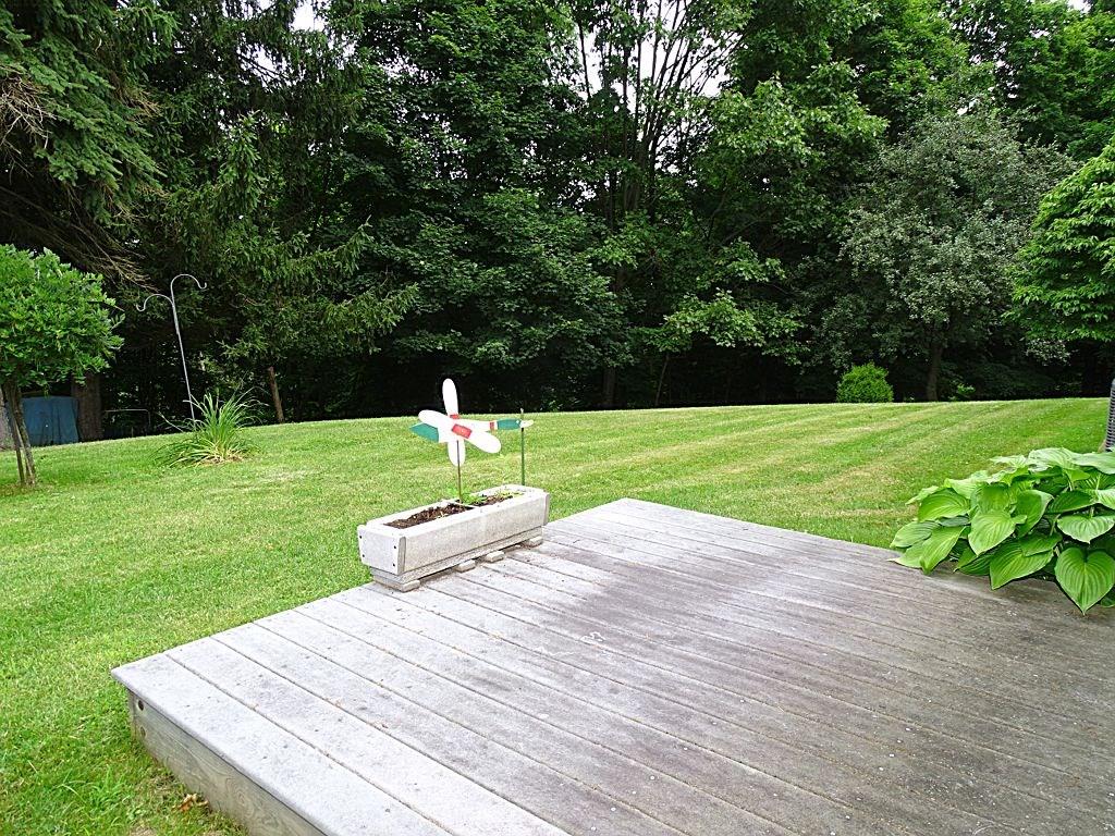 190 Deerfield Road Washington, PA 15301 - Photo 21 of 25 Small deck of the kitchen/dining room with tranquil views of the rea property