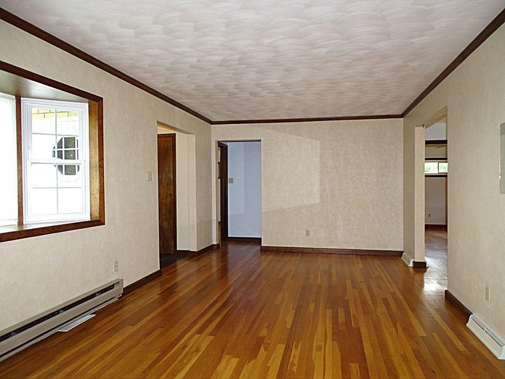 190 Deerfield Road Washington, PA 15301 - Photo 6 of 25 Gleaming hardwood floor and framed in stained crown molding