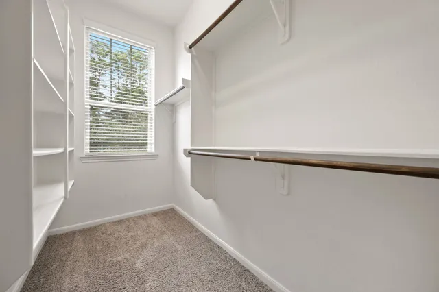 a view of a closet in a room