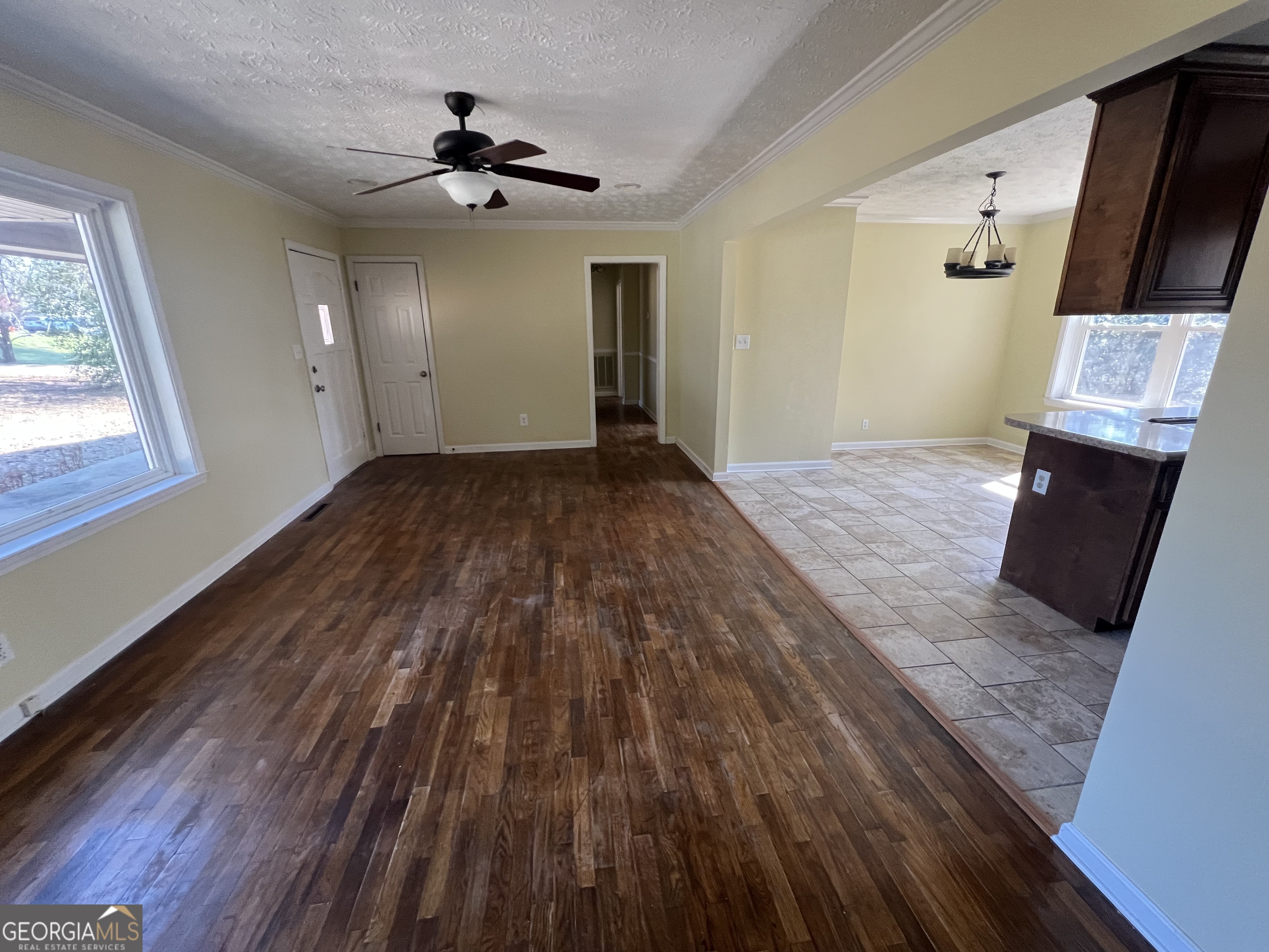 1342 North Jefferson Street Dublin, GA 31021 - Photo 10 of 15 wooden floor in an empty room with a window