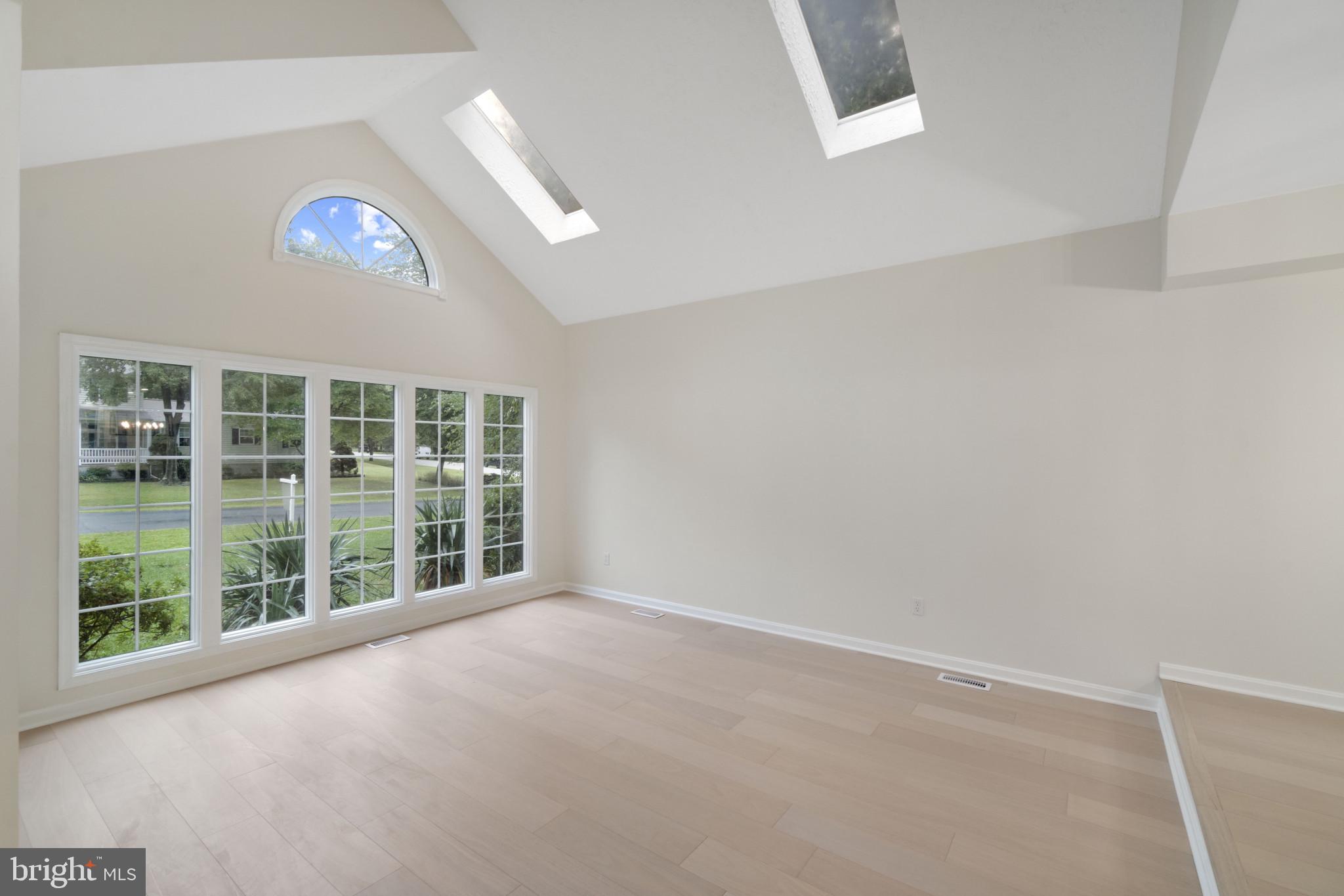 7906 Whites Cove Road Pasadena, MD 21122 - Photo 3 of 40 Spacious living room with plenty of natural light