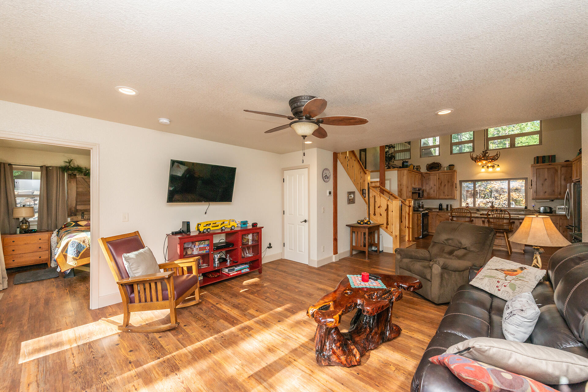 851 Mountain Aire Road Trinity Center, CA 96091 - Photo 10 of 54 a living room with furniture and a flat screen tv