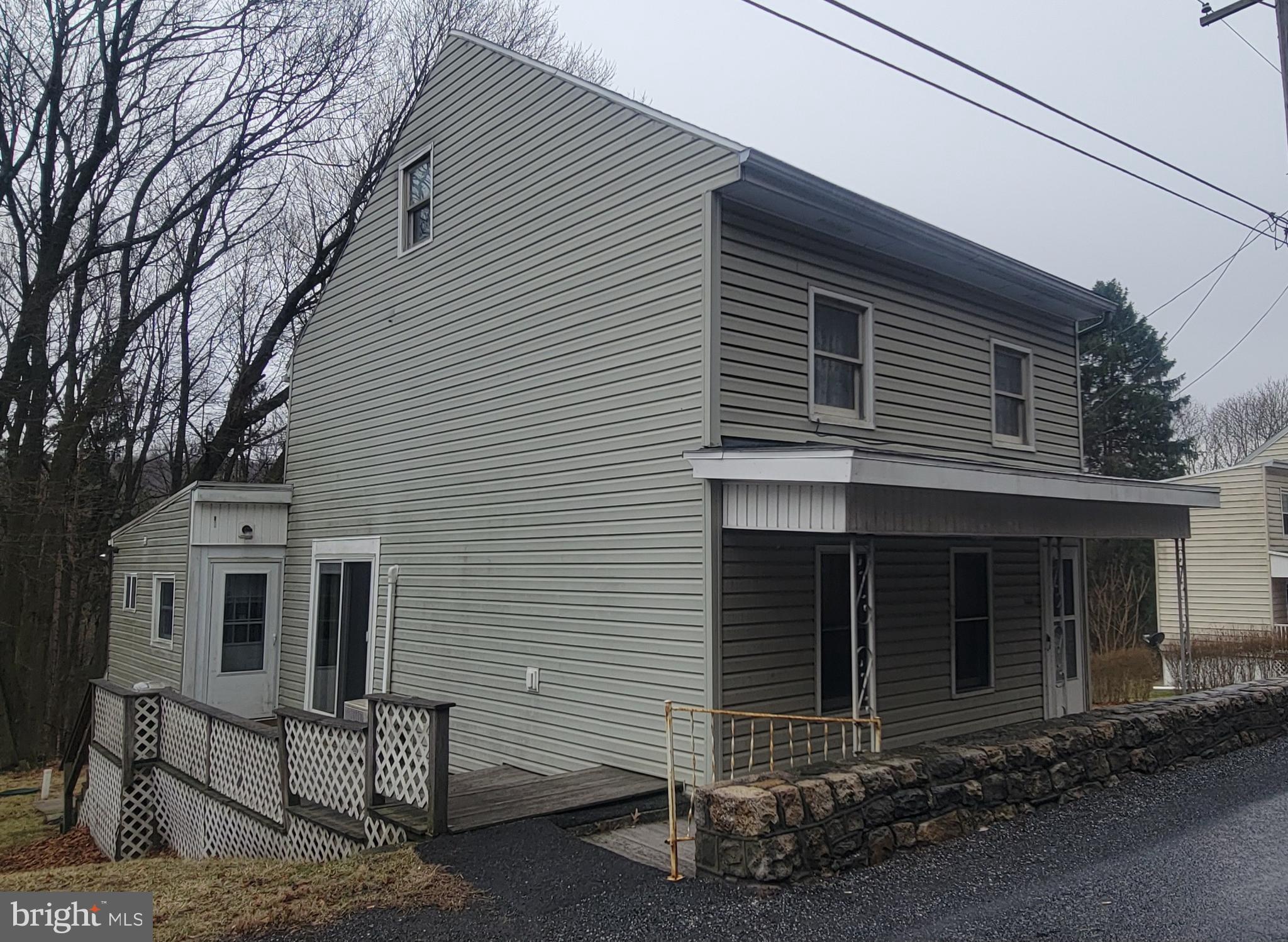 a front view of a house with garage