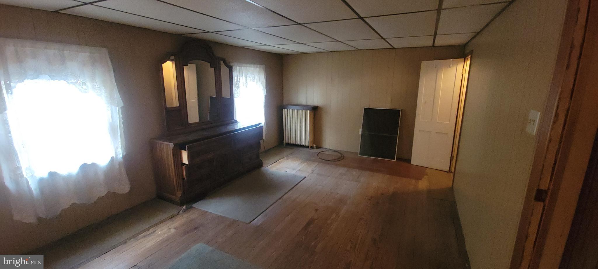 511 Mount Olive Blvd. Shenandoah, PA 17976 - Photo 21 of 34 a view of hallway with stairs and wooden floor